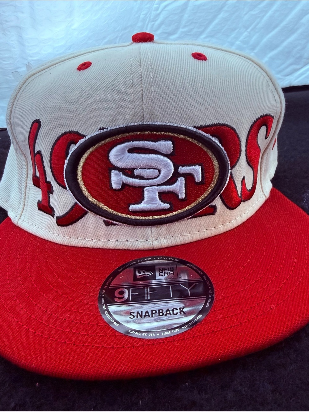 San Francisco 49ers 9FIFTY Black, Cream & Red Snapback with Teal Undervisor